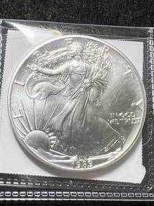 lot 40 image: 1989 AMERICAN SILVER EAGLE 1 TROY OZ .999 FINE SILVER