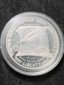 lot 54 image: 1987 US CONSTITUTION COMMEM SILVER DOLLAR IN AIRTITE