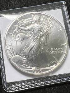 lot 59 image: 1989 AMERICAN SILVER EAGLE 1 TROY OZ .999 FINE SILVER
