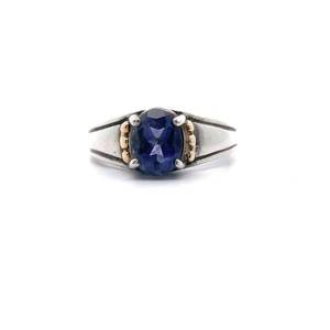 lot 32 image: Oval Iolite Solitaire Modern Grooved Two-Tone Ring