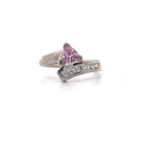 lot 89 image: Pink Ice & White Cubic Zirconia Toi et Moi Pav Ring