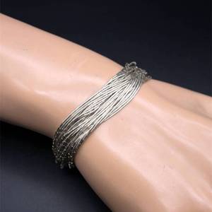 lot 54 image: Vintage Liquid Silver Multi-Strand Bracelet
