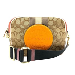 lot 98 image: Coach Signature Canvas Crossbody with Orange Leather Round Patch Pre-Owned Retail $350