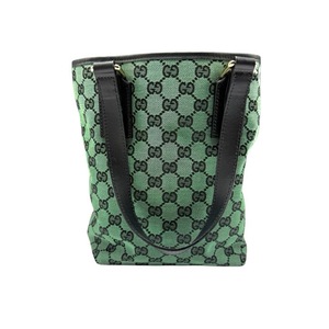 lot 105 image: Gucci Green GG Canvas Tote Bag with Black Leather Trim Pre-Owned Retail $850