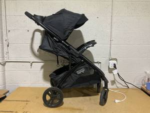 lot 59 image: Baby Trend Tango Stroller with Center Fold