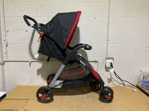 lot 70 image: Disney Baby Mickey Mouse Simple Fold LX Travel System