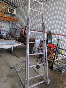 lot 35 image: Rolling 4-wheel Ladder