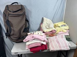 lot 30 image: Large Lot of Bath Towels, Hand Towels, Rolling Bag and More