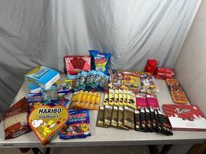 lot 54 image: Assorted Candy, Turtles, Almond Roca, Gummy Candy, Chocolate Bars, and More