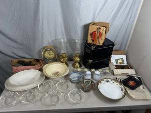 lot 57 image: Hurricane Lamps, Glasbake Dishes, Noritake, Assorted China, Clock, Antique Iron, and More