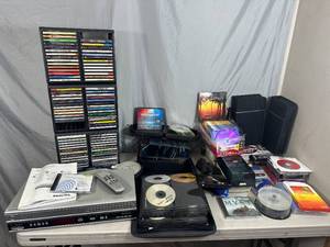 lot 72 image: VCR  DVD Player, Large Lot of CDs, Computer Discs, DVDs, and More
