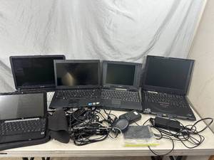 lot 93 image: Assorted Vintage Laptop Computers - One Broken Screen