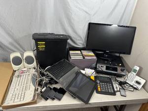 lot 95 image: Assorted Electronics, Ipad, Ipods, Kodak Projector, and More.