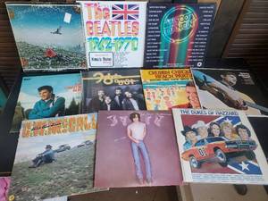 lot 14 image: Lot of Vintage Records Mellencamp, Elvis, Beatles and more