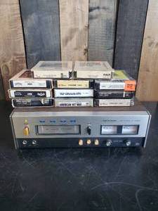 lot 22 image: Realistic TR-882 Cartrige Tape Recorder With 8 Track Tapes of Various Artists