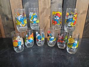 lot 62 image: 10 Vintage Smurf Glasses in good Vibrant Condition No Chips or Cracks