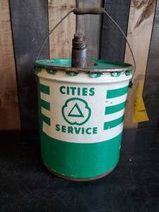 lot 84 image: Awesome Cities Service 5 gallon Metal Can with Spout and wooden handle
