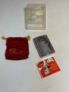 lot 12 image: Vintage Jon-E Hand Warmer