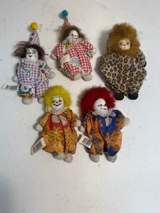 lot 56 image: Porcelain FaceSoft Bean Bag Body Clown Jester Dolls