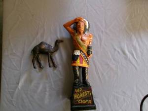 lot 27 image: Old Honesty Cigar Piggy Bank