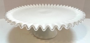 lot 6 image: Vintage Fenton Milk Glass Cake Stand with Silver Crest Edge