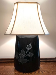 lot 14 image: Black Ceramic Table Lamp with White Etched Calla Lily Design and Shade