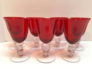 lot 82 image: Set of 7 Red Stemmed Wine Glasses with Clear Ball Bases