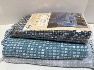 lot 99 image: Set of 3 Woven Oblong Tablecloths, Blue Pattern, 1 Sealed