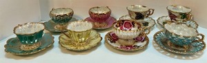 lot 35 image: Set of 8 Hand Painted Vintage Fan Crest Teacups and Saucers Iridescent with Gold Trim