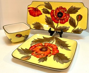 lot 38 image: La Dolce Vita Red Poppy Embossed Collection Serving Set by JJD Designs