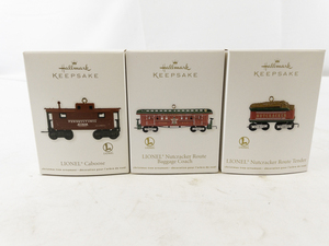 lot 131 image: Set of 3 Hallmark Keepsake Lionel Nutcracker Route Train Car Ornaments