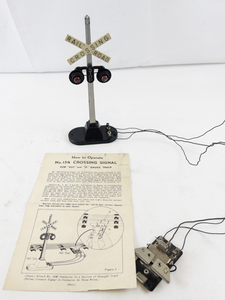 lot 27 image: Lionel No. 154 Railroad Crossing Signal with Track Connector and Instructions