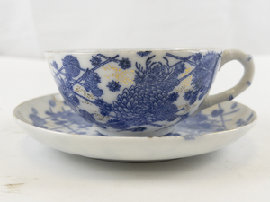 lot 48 image: Vintage Bone China Teacup and Saucer with Blue Floral Design and Gold Rim