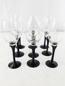 lot 179 image: Set of 9 Wine Glasses with Grape Etching and Twisted Black Stems