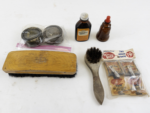 lot 76 image: Vintage Household Supplies with Brushes, Mouse Traps, Bottles, and Shoe Polish