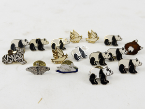 lot 81 image: Collection of Animal-Themed Lapel Pins Including Pandas and Peace Doves