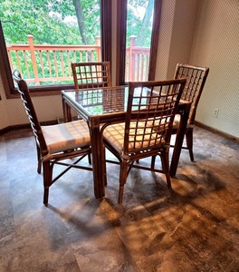 Rattan Dining Table with Glass Top and 4 Chairs with Cushions. Great Condition!