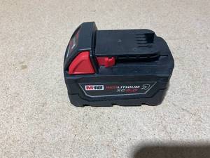 lot 37 image: Milwaukee 48-11-1850R M18 18-Volt 5.0 Ah Lithium-Ion XC Extended Capacity Resistant Battery Pack