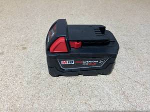 lot 38 image: Milwaukee 48-11-1850R M18 18-Volt 5.0 Ah Lithium-Ion XC Extended Capacity Resistant Battery Pack