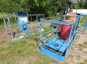 lot 33 image: 2 - Genie Boom Lift Baskets and Misc.Storage Barrel