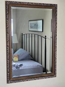 lot 24 image: Ornate Framed Beveled Glass Wall Mirror