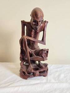 lot 85 image: Skeletal Sitting Man Wood Sculpture Carving