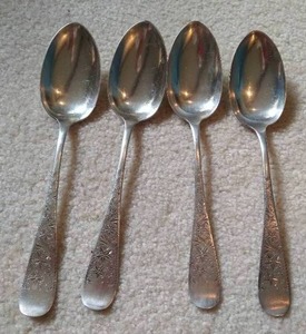 lot 12 image: Four Large Sterling Spoons