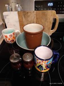 lot 71 image: Mugs, Cutting Board, Crock, S&P Shakers