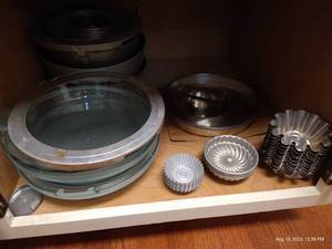 lot 85 image: Cupboard of Jello & Cake Molds, Pie Pans, Bundt Pans, Pots & Pans