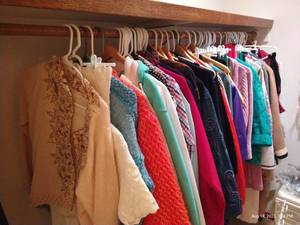 lot 137 image: Left Side of Closet Womens Clothes Some Fun Vintage Finds