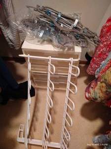lot 139 image: Closet Supplies Plastic Drawers, Shoe Rack, Hangers