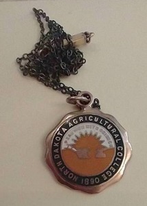 lot 171 image: North Dakota Agricultural College Gold Pendant