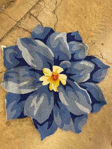 lot 12 image: Flower Shaped Blue Polypropylene Throw Rug