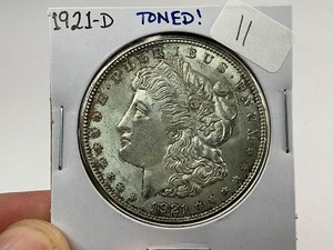 lot 11 image: 1921-D Morgan Silver Dollar Toned